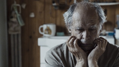 The face of an old man thinking.