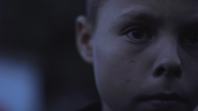 A boy's face with a deep look.