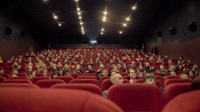People in the cinema theatre.